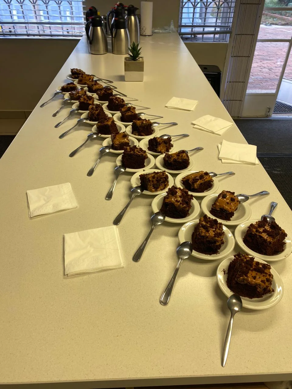 Nia Bloom Bakes catering table prepared for an event